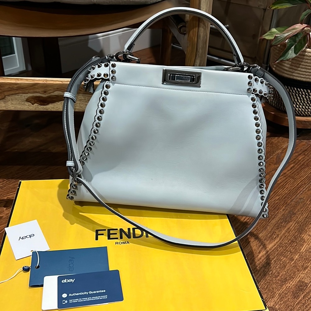 Blue with studs Fendi peek-a-boo with silver/black hardware